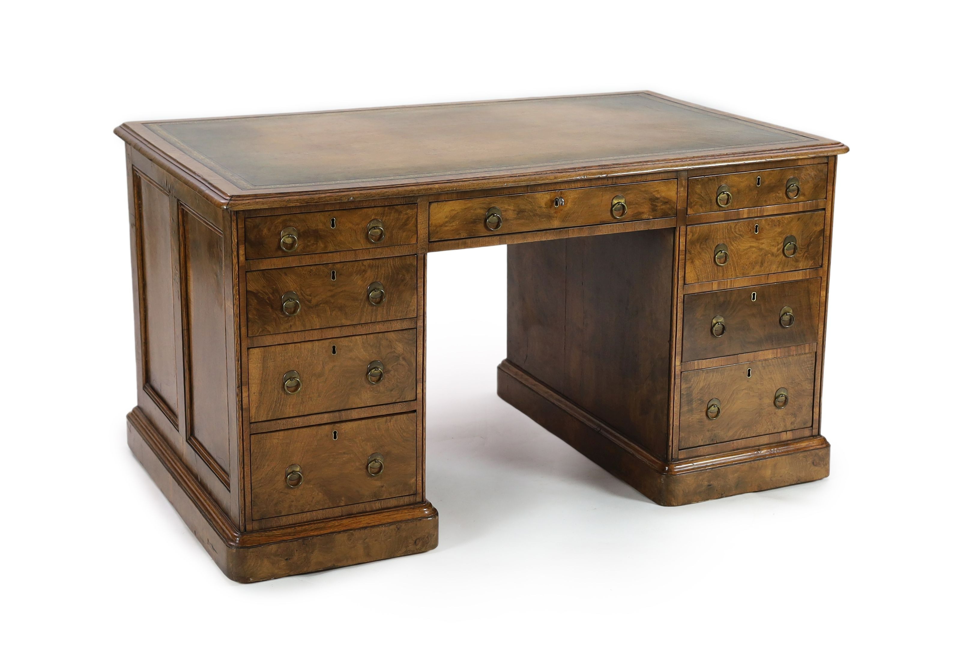 A late Victorian Gillow & Co. walnut pedestal desk, W.137cm D.85cm H.76cm